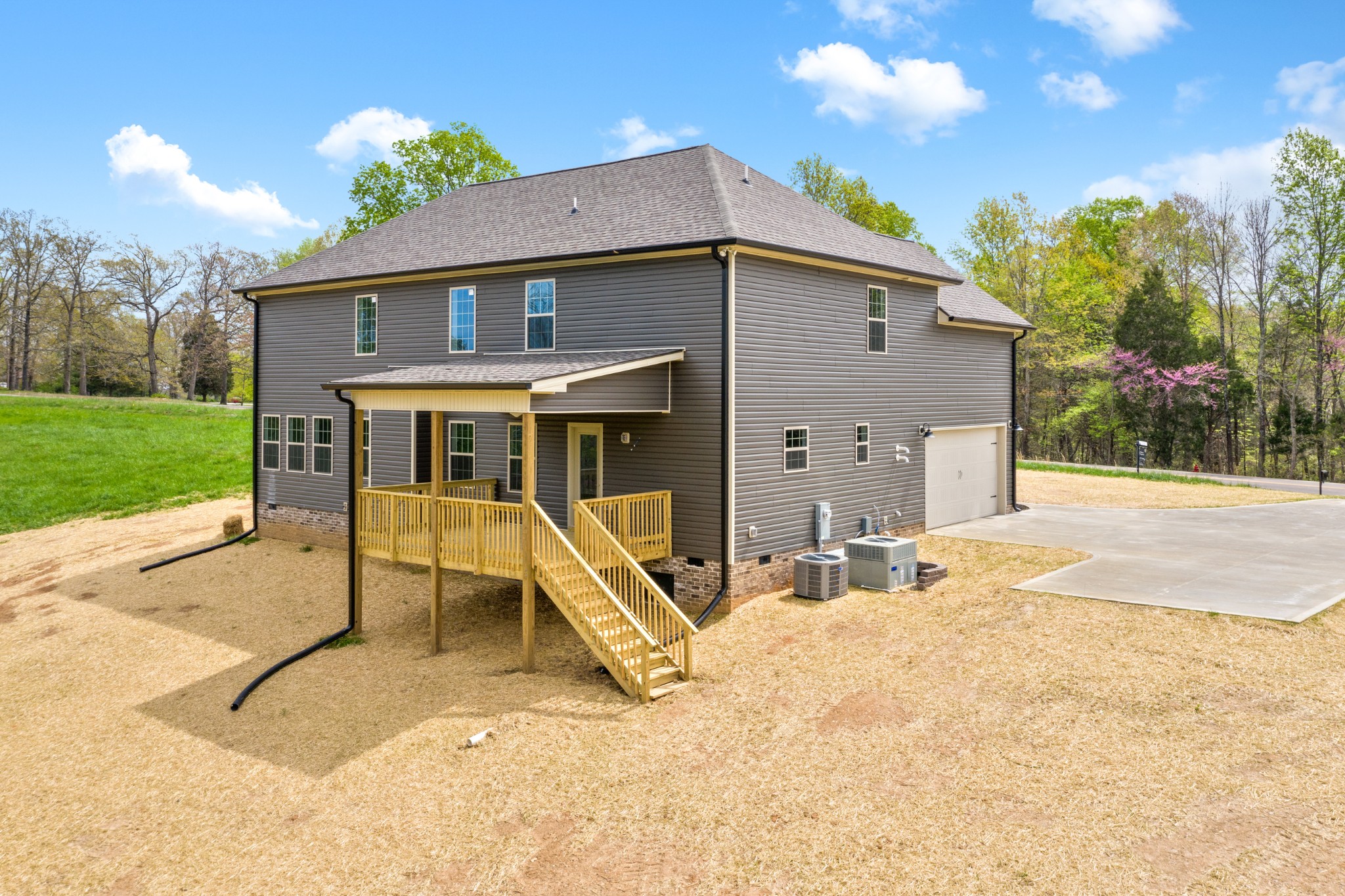 267 Alonzo Place Cunningham, TN 37052 - Photo 40 of 40 a view of a house with backyard porch and sitting area