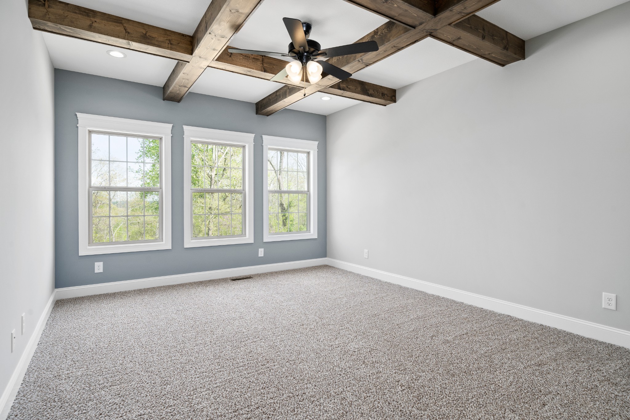 267 Alonzo Place Cunningham, TN 37052 - Photo 4 of 40 an empty room with windows and fan