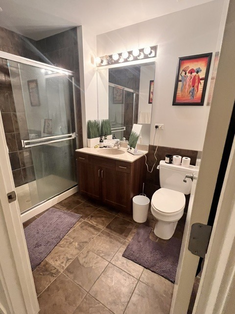 235 West Van Buren Street, Unit 2415 Chicago, IL 60607 - Photo 17 of 19 a bathroom with a sink and a mirror