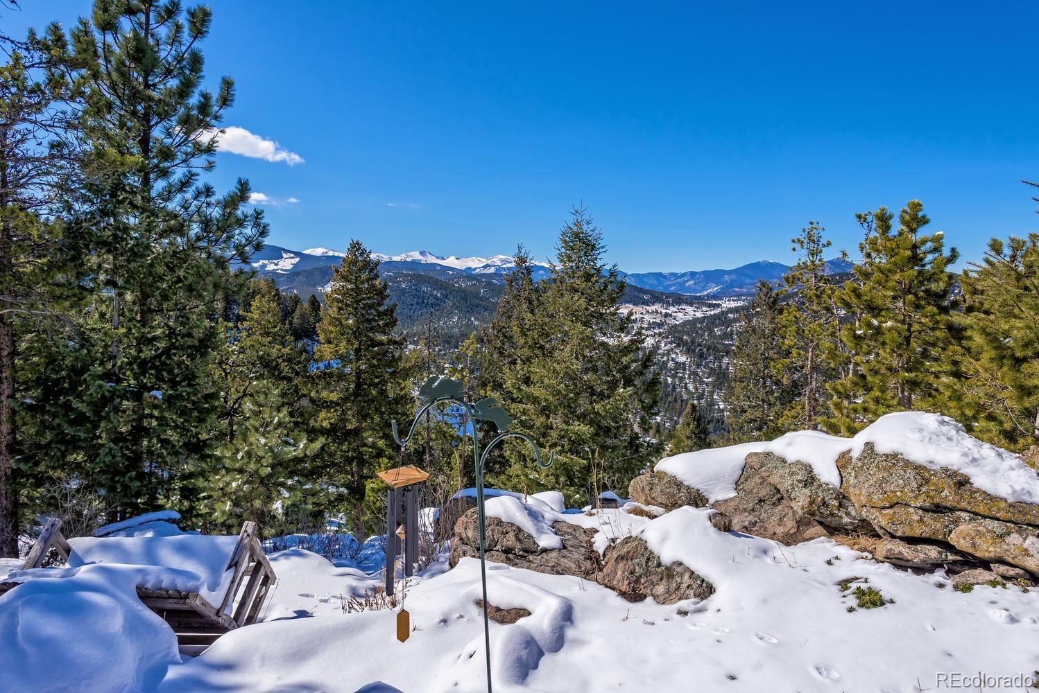 29323 Gray Hawk Drive Evergreen, CO 80439 - Photo 28 of 31 a view of backyard with furniture