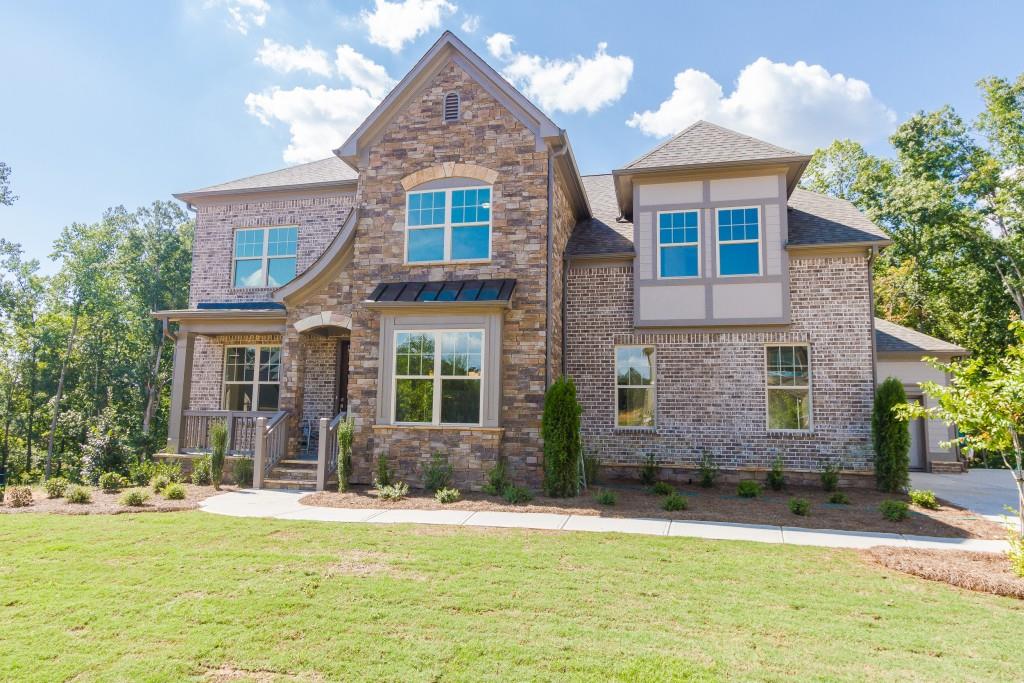 3765 Valleyway Road Cumming, GA 30040 - Photo 1 of 1 The Hamilton "G" on homesite 77 has a gorgeous stone and brick exterior with a covered front porch, 3rd car garage and full unfinished basement.