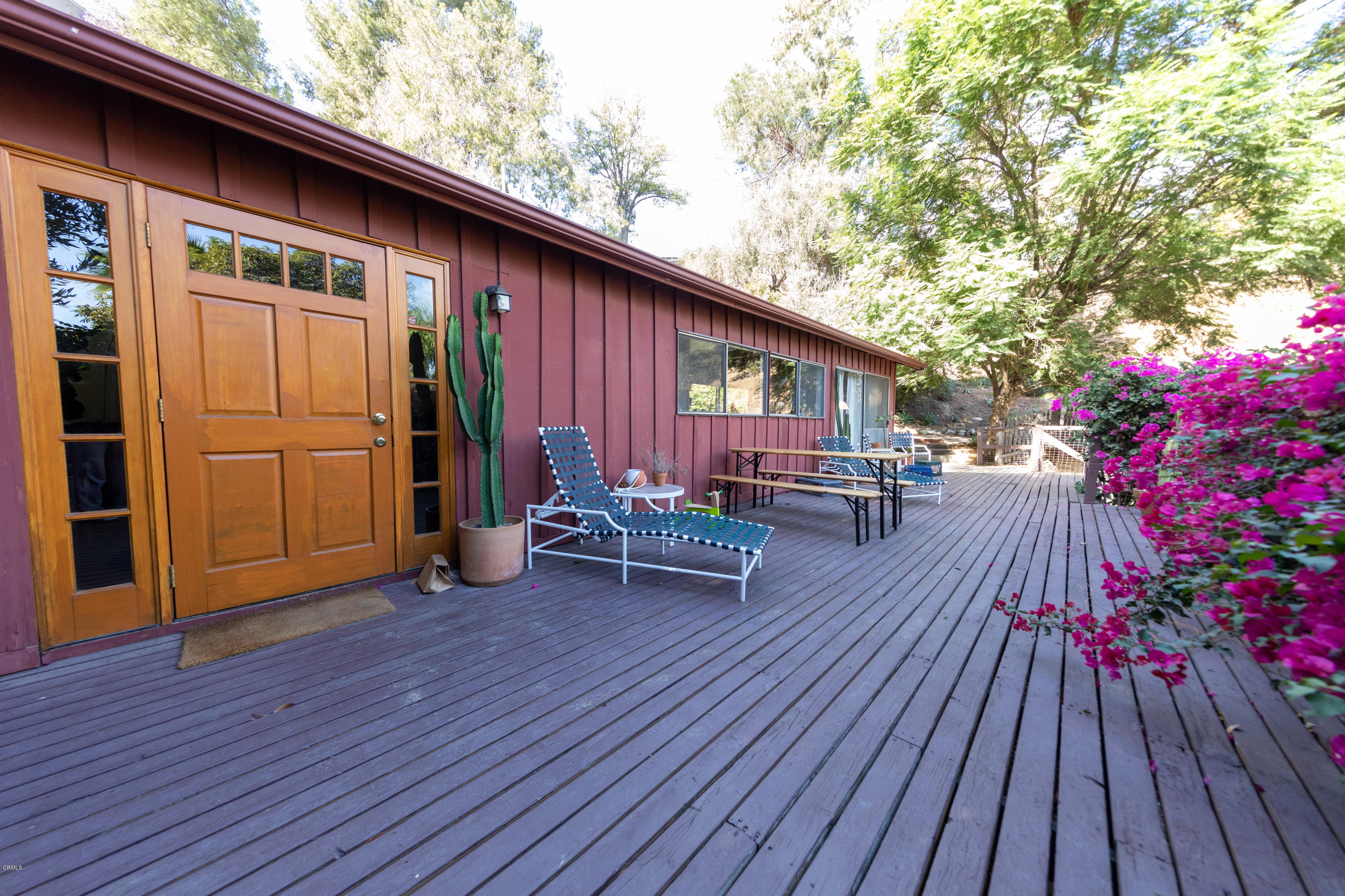 503 Quail Drive Los Angeles, CA 90065 - Photo 1 of 16 a view of outdoor seating space with wooden floor