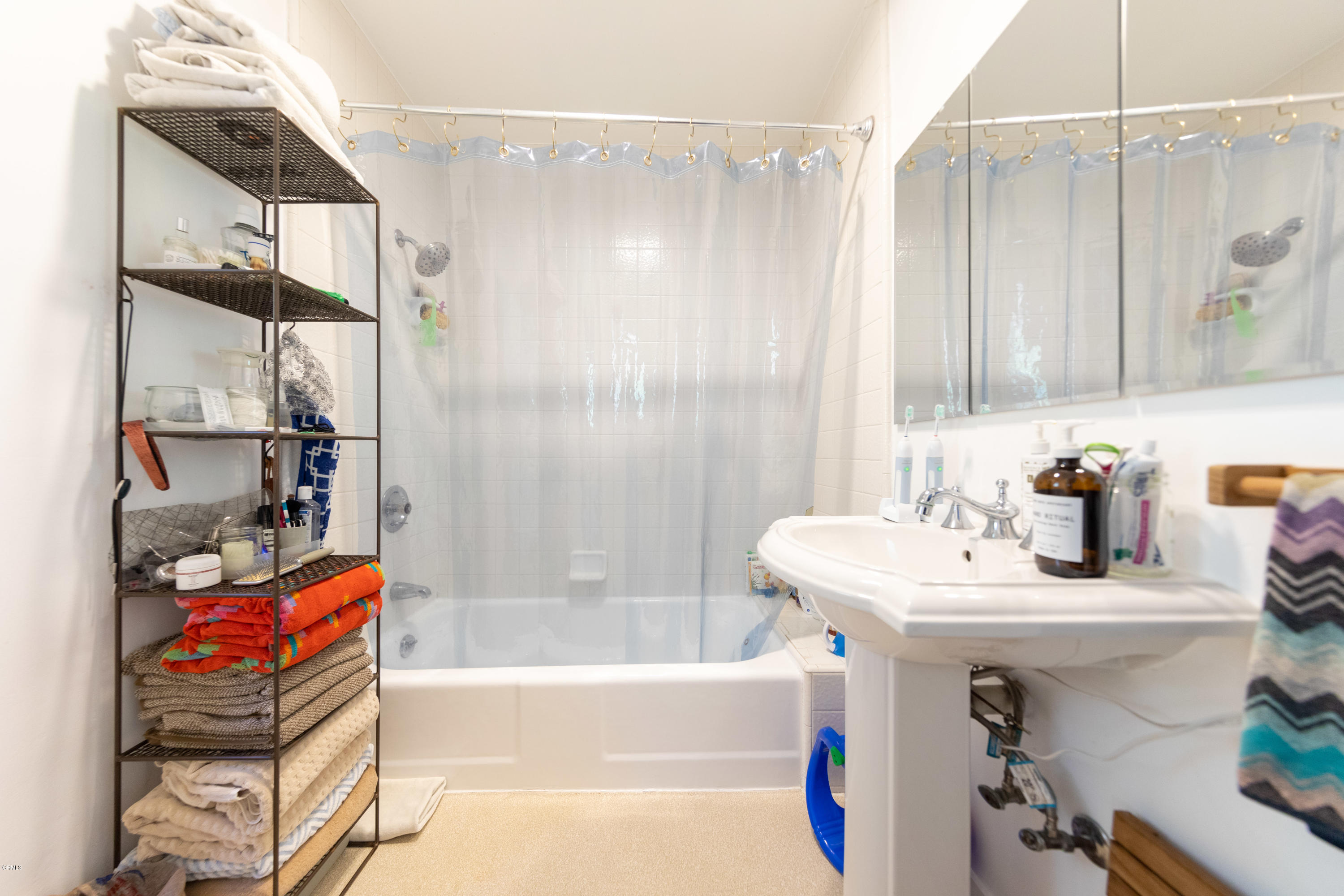 503 Quail Drive Los Angeles, CA 90065 - Photo 13 of 16 a bathroom with a sink toilet and shower