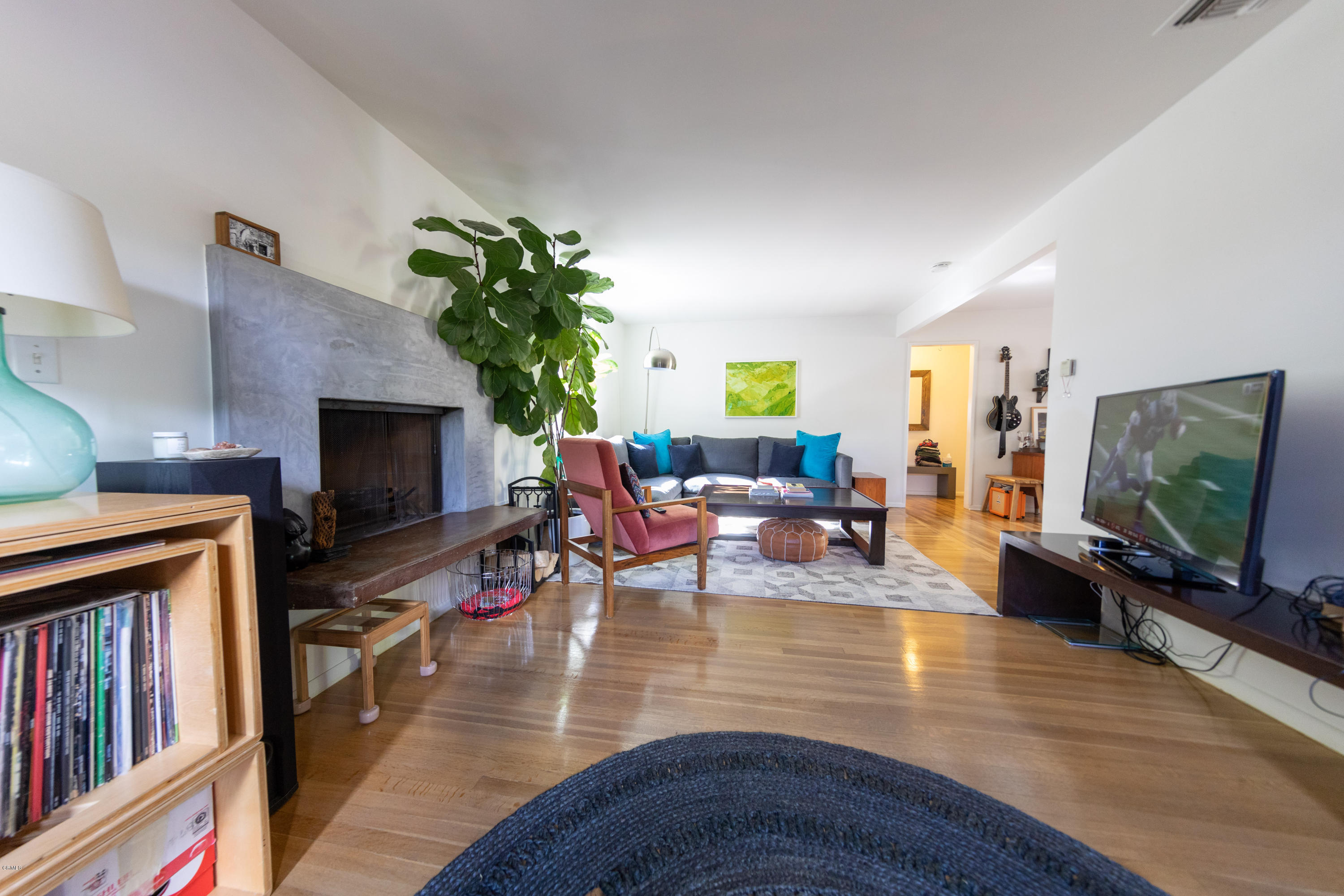 503 Quail Drive Los Angeles, CA 90065 - Photo 4 of 16 a living room with furniture and a flat screen tv
