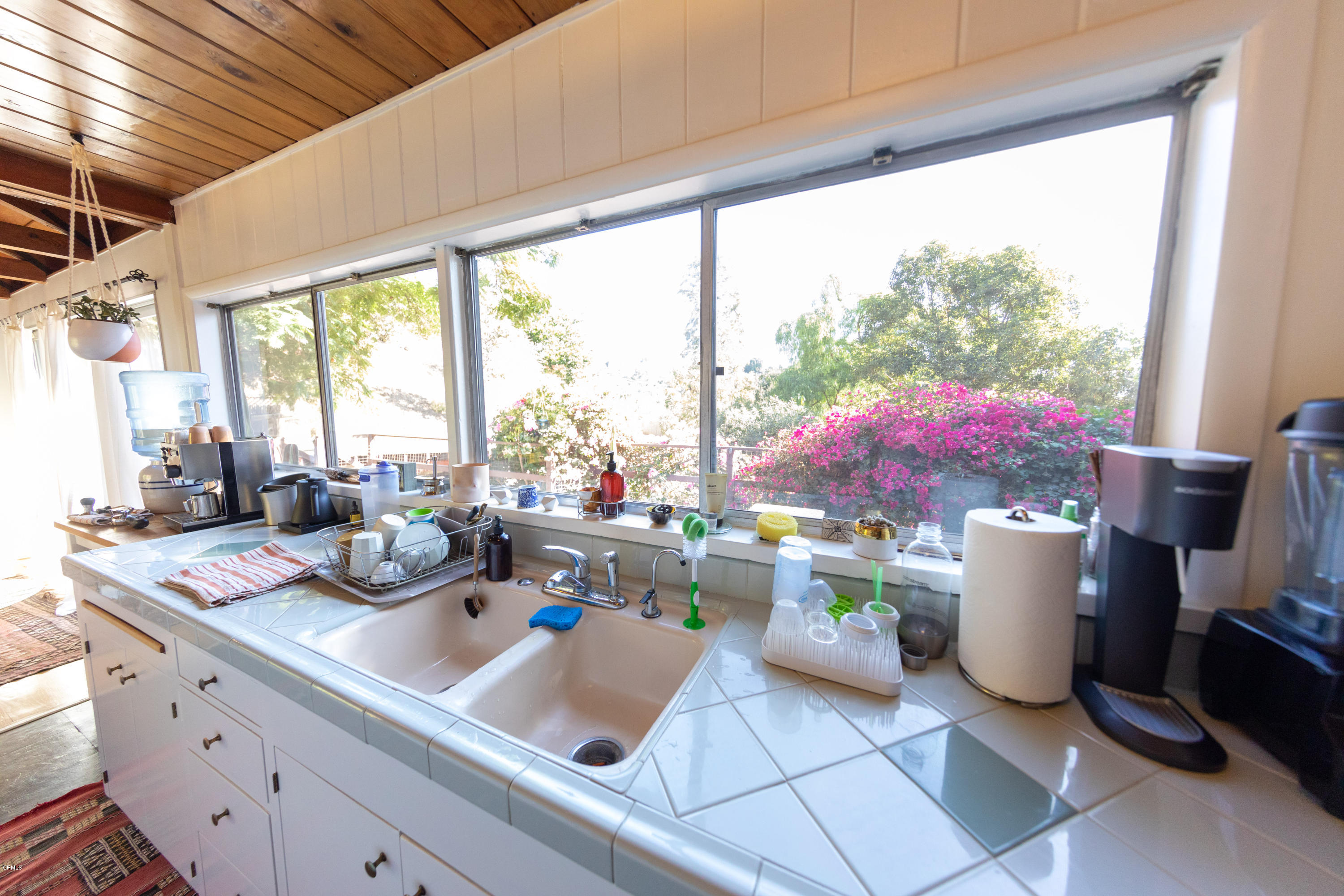 503 Quail Drive Los Angeles, CA 90065 - Photo 6 of 16 a room with a large window and dining table