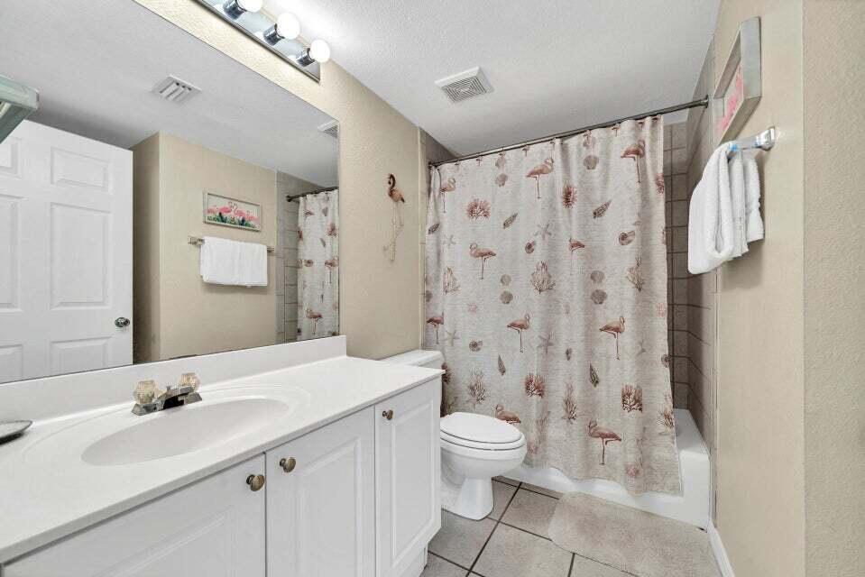 520 Santa Rosa Boulevard, Unit 217 Fort Walton Beach, FL 32548 - Photo 18 of 26 a bathroom with a sink toilet and shower
