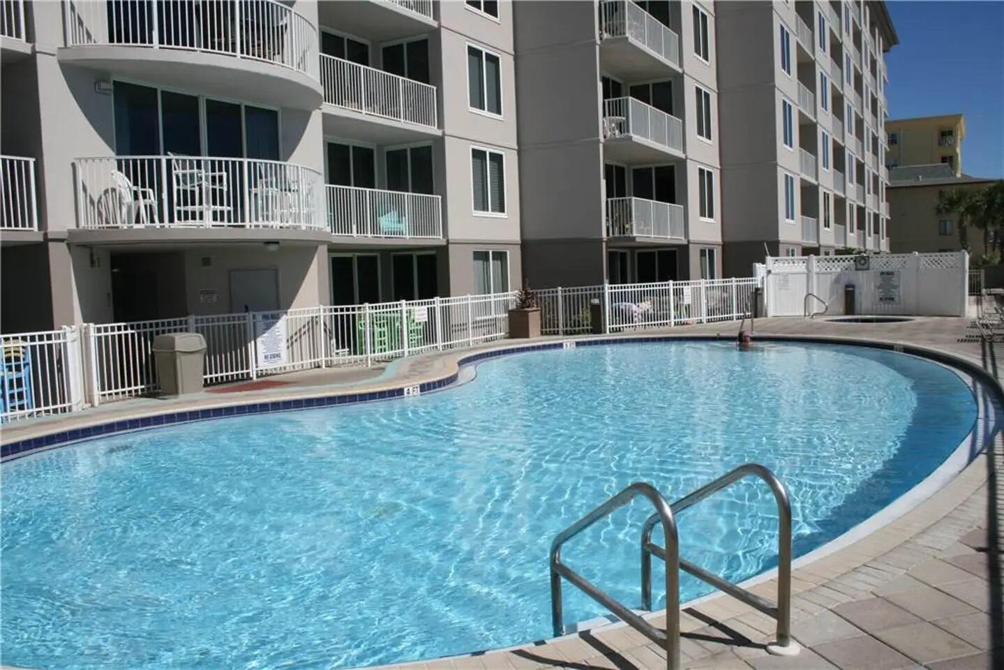 520 Santa Rosa Boulevard, Unit 217 Fort Walton Beach, FL 32548 - Photo 22 of 26 a view of a building with a backyard