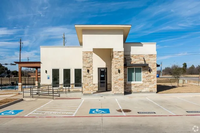 a front view of a building with street