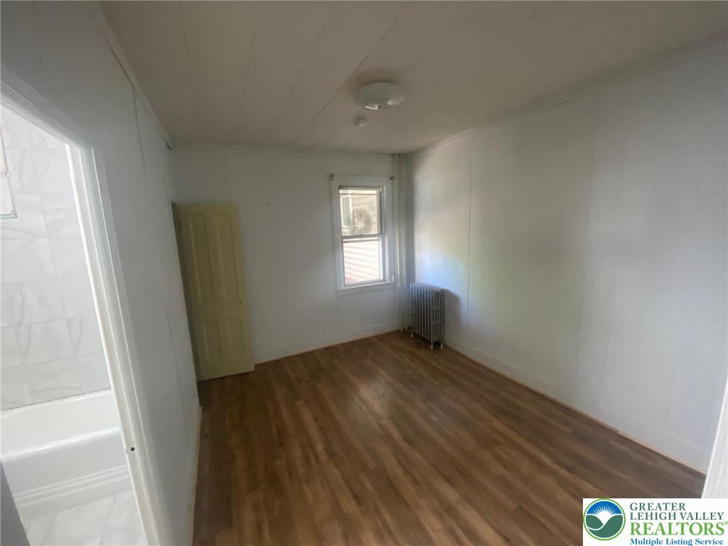 15 West High Street, Unit 1 Coaldale, PA 18218 - Photo 4 of 5 a view of an empty room and window
