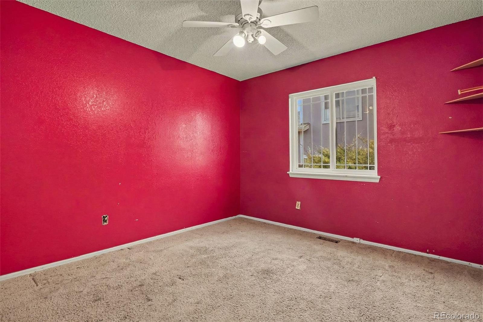 4105 South Laredo Way Aurora, CO 80013 - Photo 8 of 11 a view of empty room with fan