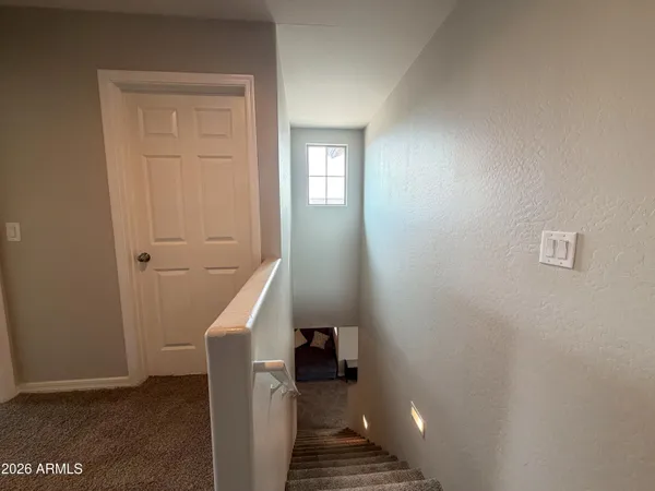 a utility room with closet dryer and washer