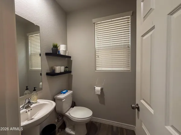 a bedroom with a bed furniture and a window