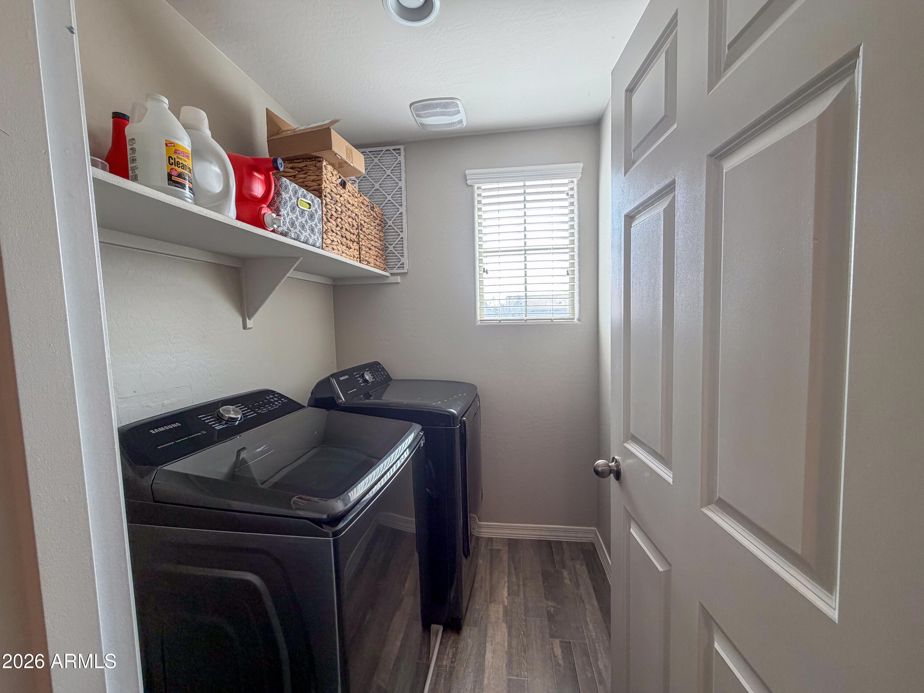 5480 Fulton Street Phoenix, AZ 85043 - Photo 26 of 63 a utility room with closet dryer and washer