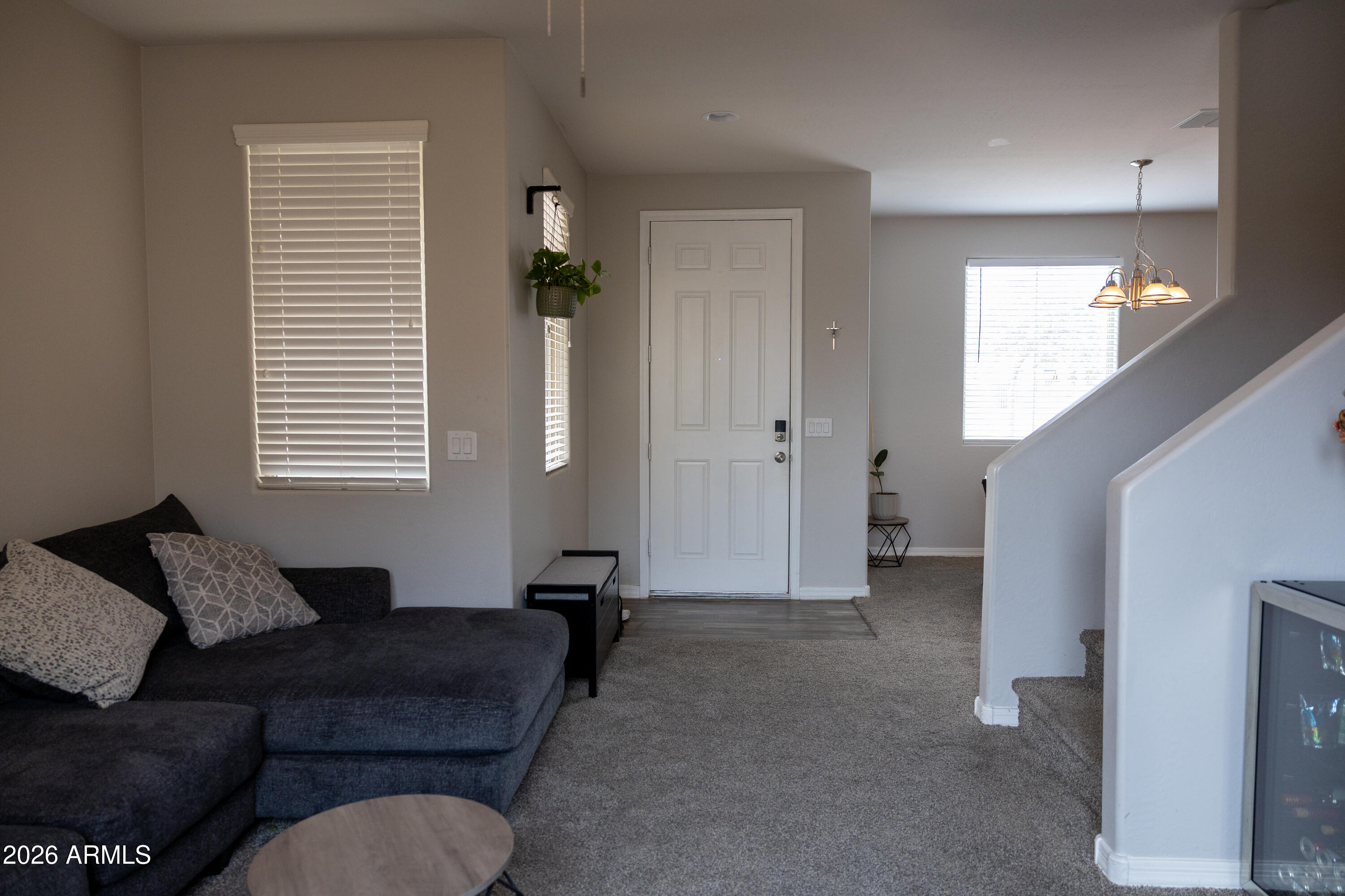 5480 Fulton Street Phoenix, AZ 85043 - Photo 4 of 63 a living room with furniture and a window