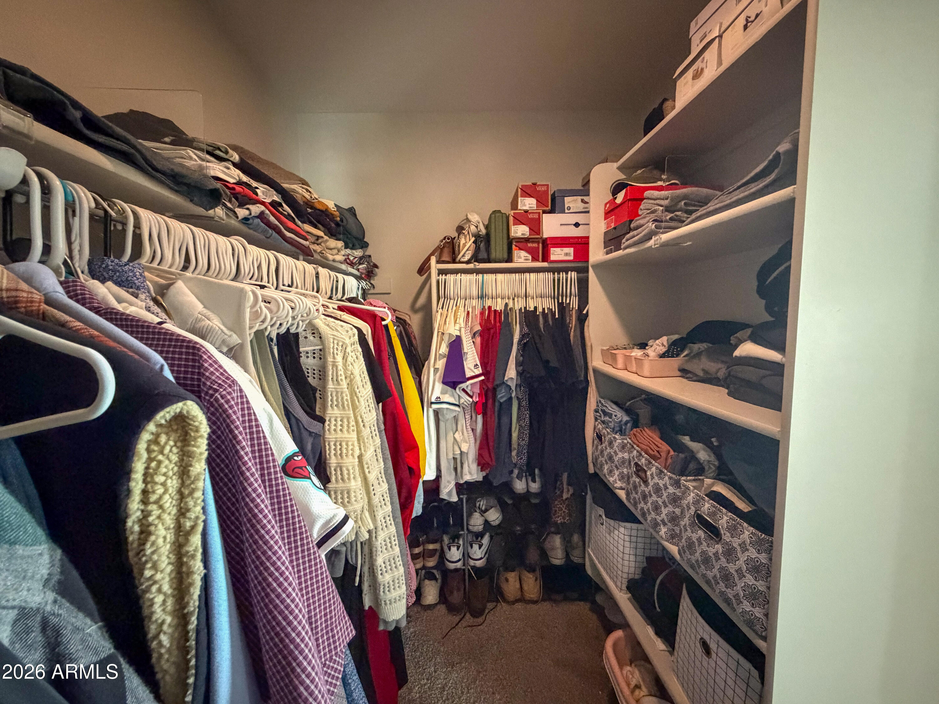 5480 Fulton Street Phoenix, AZ 85043 - Photo 48 of 63 a view of walk in closet with clothes