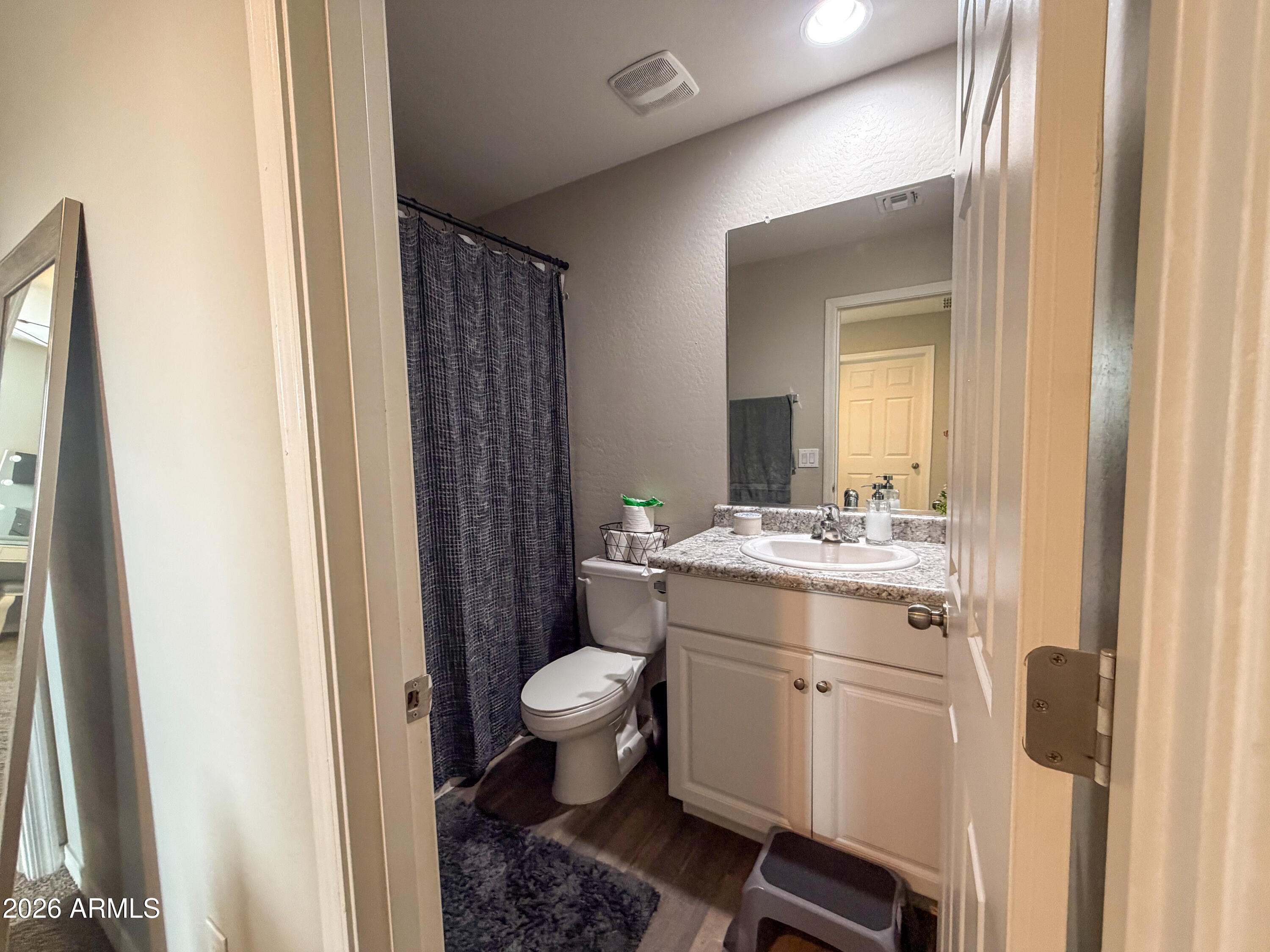 5480 Fulton Street Phoenix, AZ 85043 - Photo 51 of 63 a bathroom with a sink toilet and shower