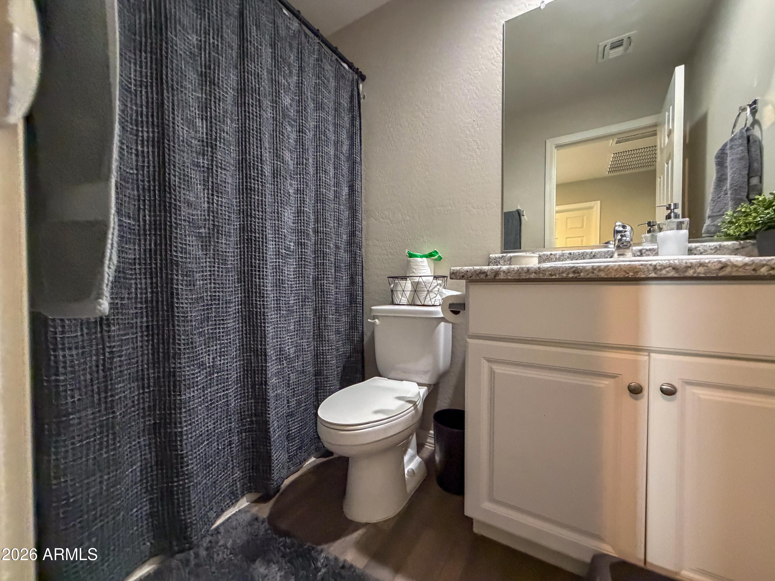 5480 Fulton Street Phoenix, AZ 85043 - Photo 53 of 63 a bathroom with a sink toilet and shower