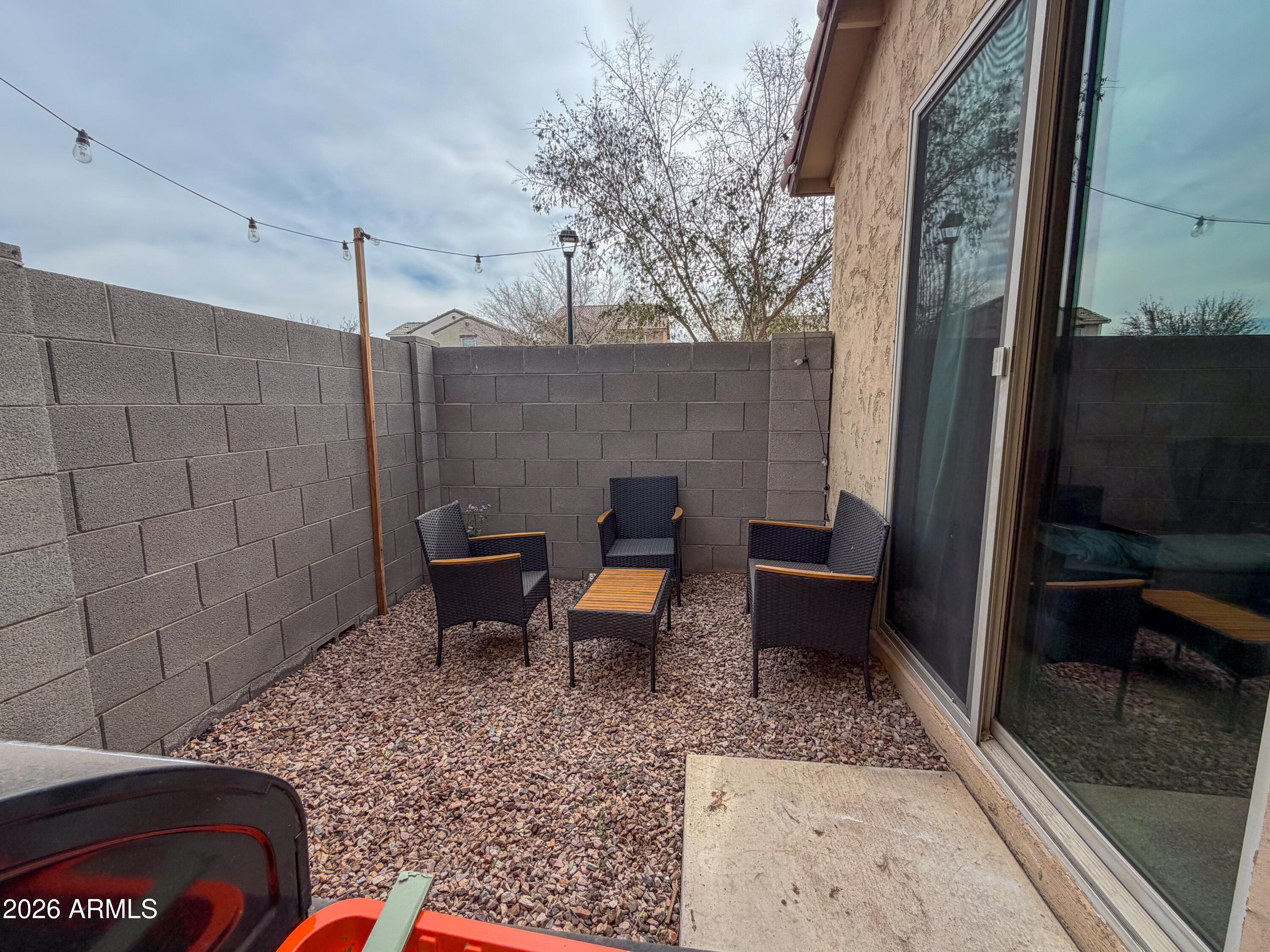 5480 Fulton Street Phoenix, AZ 85043 - Photo 57 of 63 a view of a porch with furniture and a yard