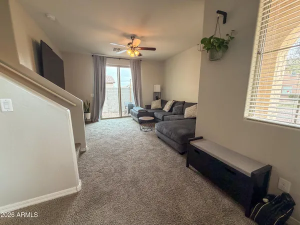 a living room with furniture and a window