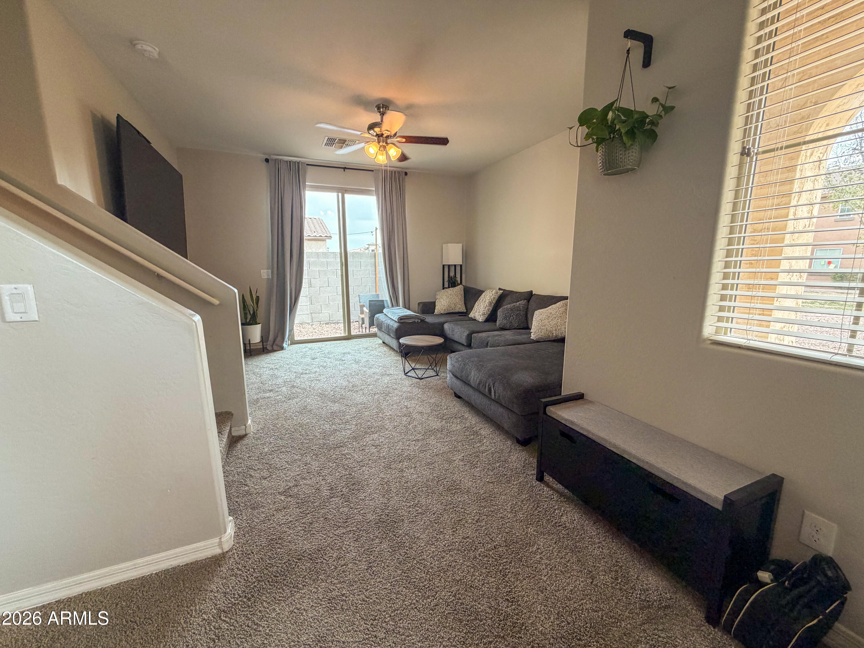 5480 Fulton Street Phoenix, AZ 85043 - Photo 7 of 63 a living room with furniture and a large window