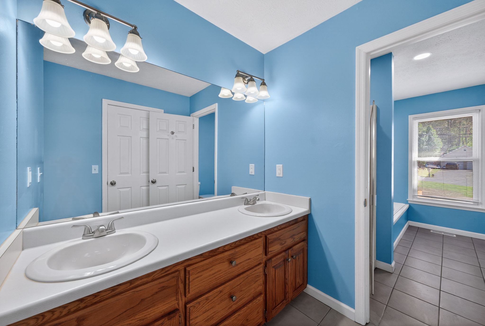 217 Timberlake Drive Springfield, TN 37172 - Photo 11 of 31 a bathroom with a sink double vanity and a mirror