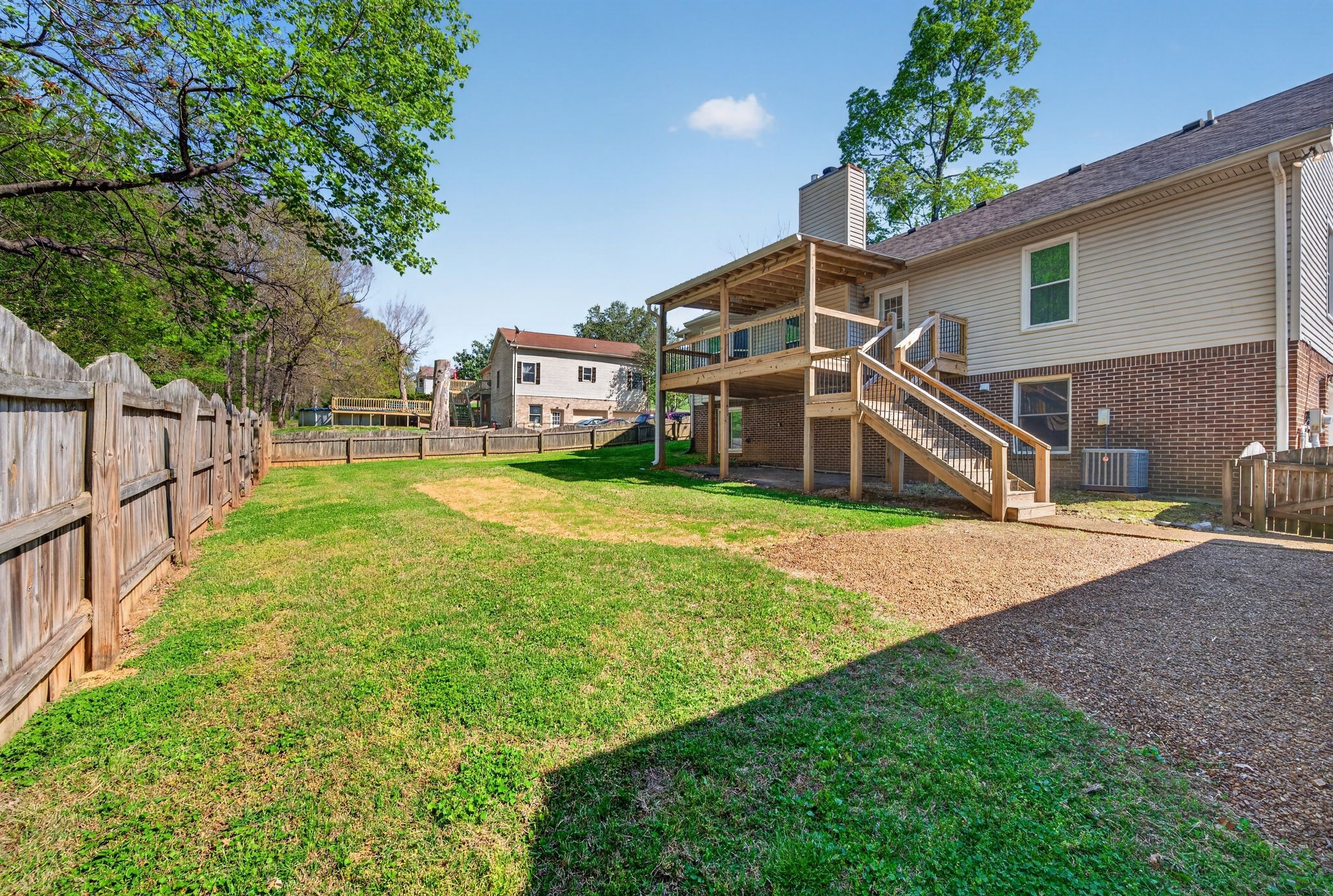 217 Timberlake Drive Springfield, TN 37172 - Photo 24 of 31 a view of a house with backyard and a tree