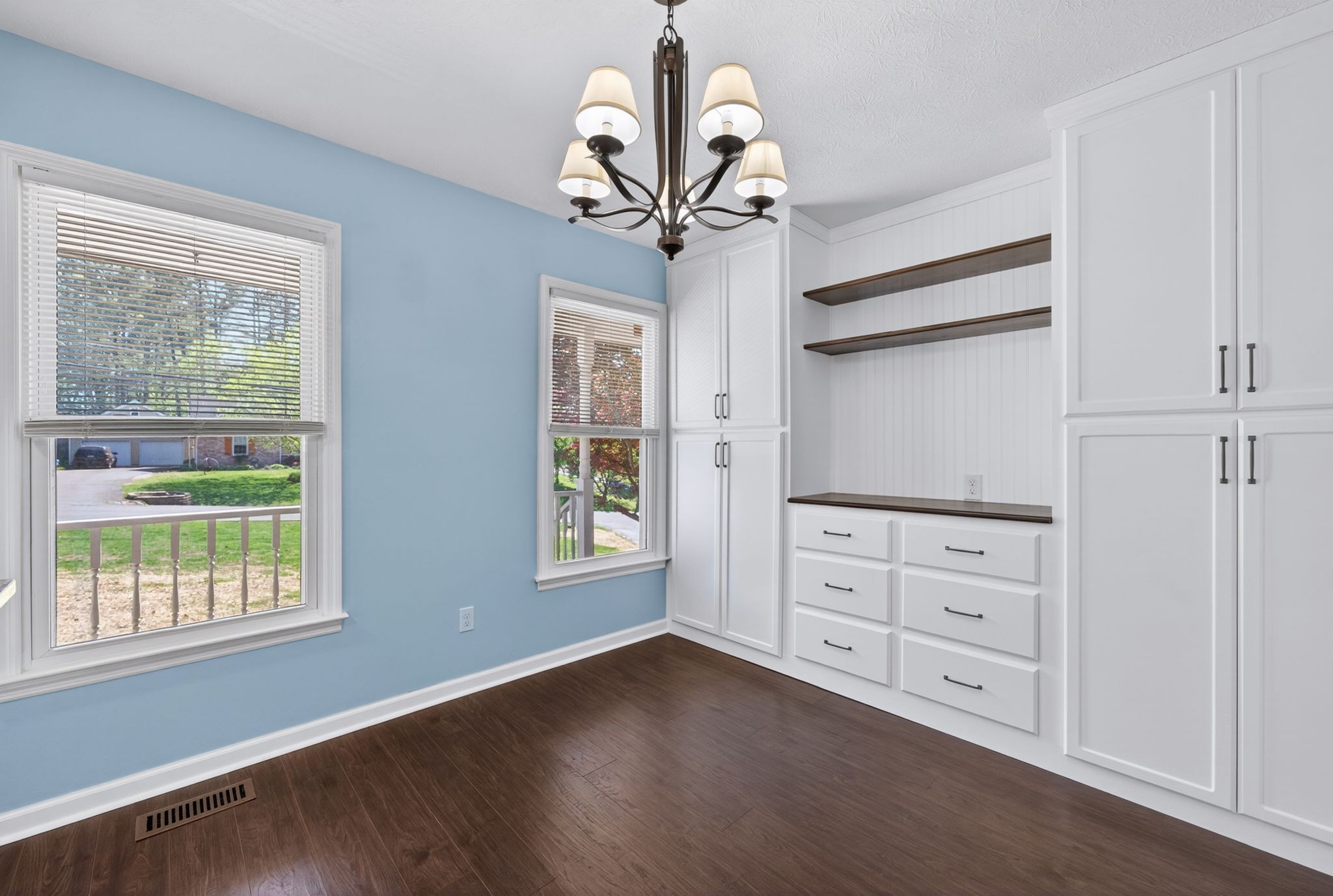 217 Timberlake Drive Springfield, TN 37172 - Photo 9 of 31 a view of an empty room with a window and wooden floor