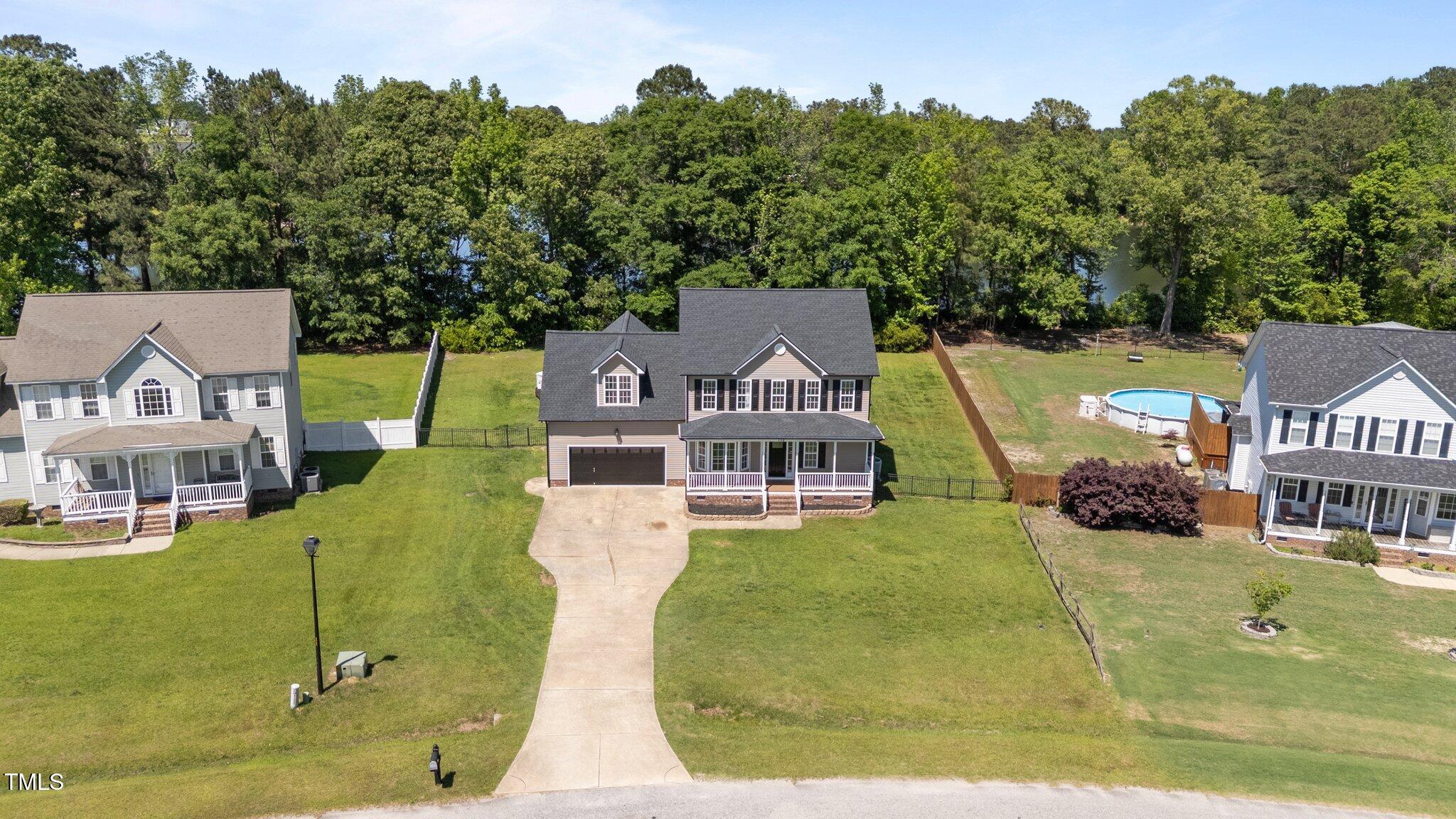 112 Roping Horn Way Willow Spring, NC 27592 - Photo 2 of 44 4-web-or-mls-DJI_20250428143820_0378_D