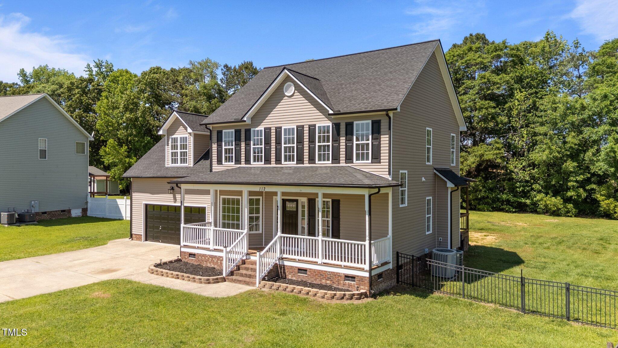 112 Roping Horn Way Willow Spring, NC 27592 - Photo 4 of 44 6-web-or-mls-DJI_20250428143338_0368_D