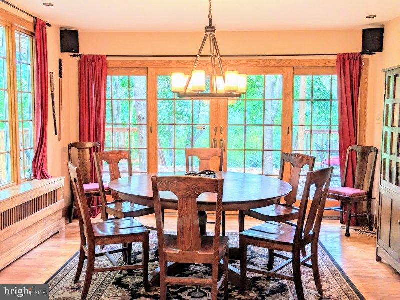 24 Blue Ridge Road Titusville, NJ 08560 - Photo 8 of 34 Dining Room with Doors leading to Back Deck
