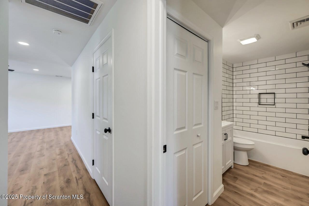 110 Morgan Street Jessup, PA 18434 - Photo 23 of 45 a bathroom with a toilet and a shower