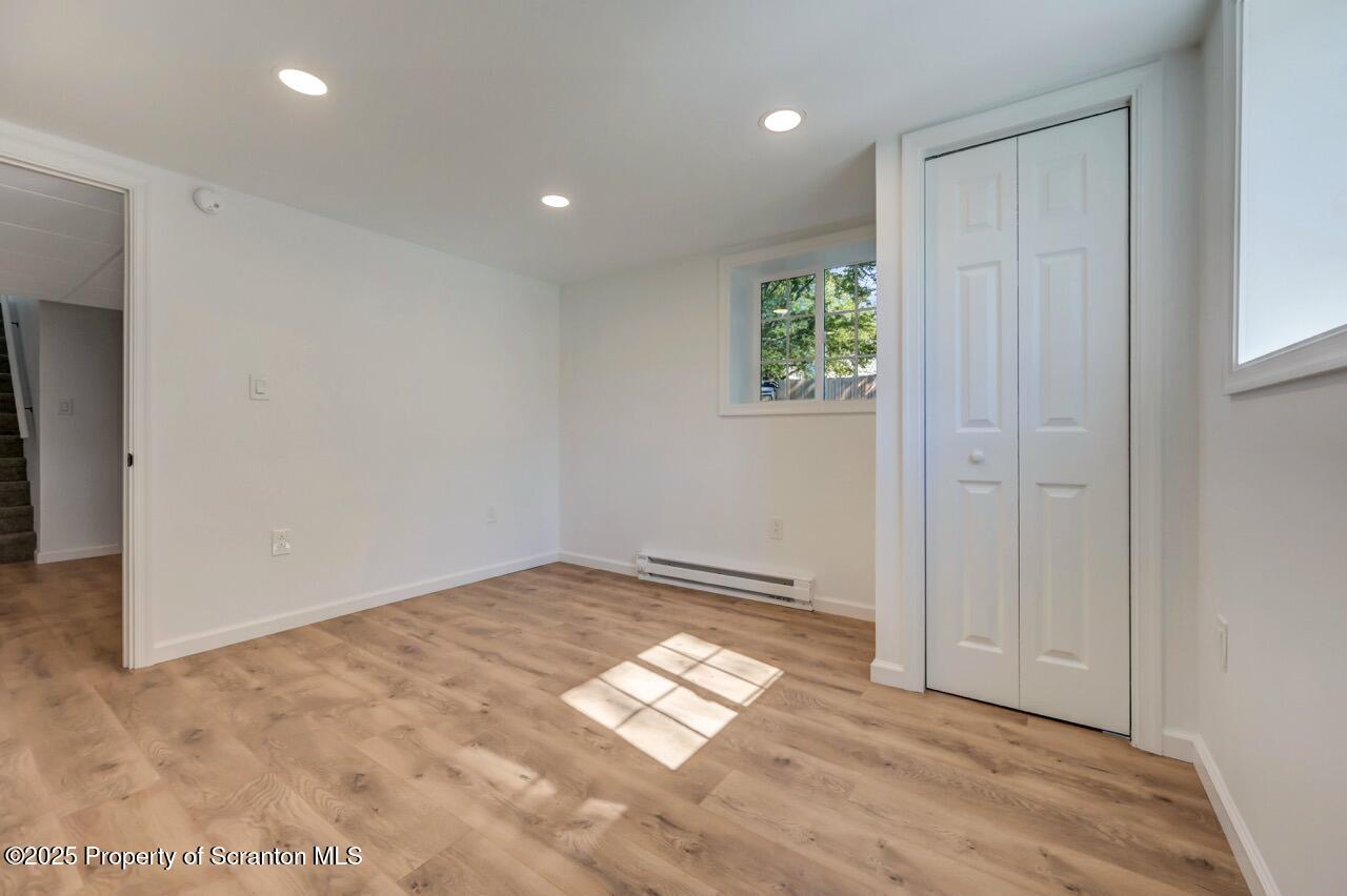 110 Morgan Street Jessup, PA 18434 - Photo 34 of 45 an empty room with yard and windows