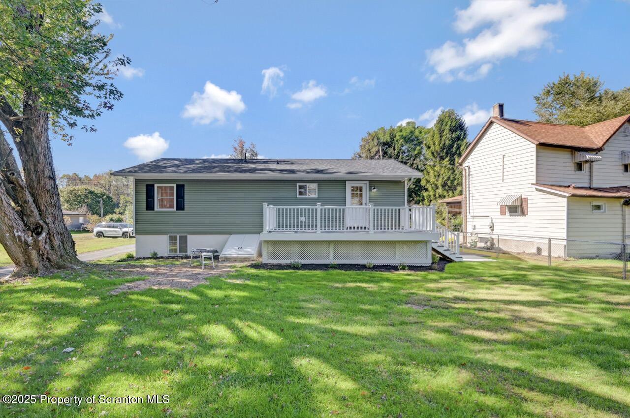 110 Morgan Street Jessup, PA 18434 - Photo 40 of 45 a view of a house with a yard and sitting area