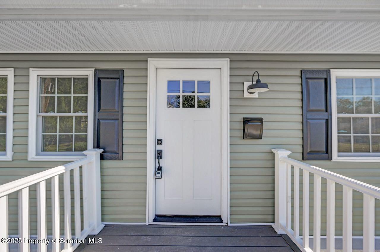 110 Morgan Street Jessup, PA 18434 - Photo 4 of 45 a view of front door