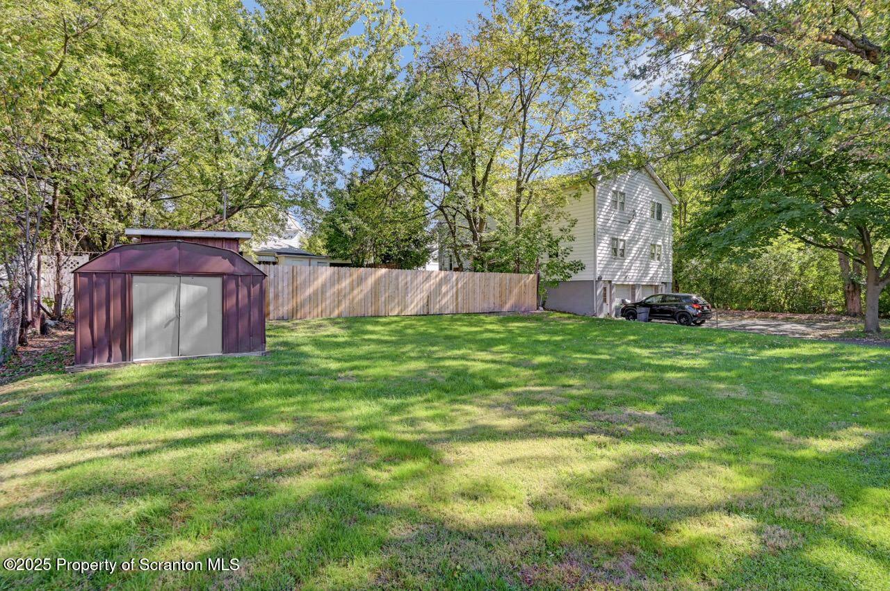 110 Morgan Street Jessup, PA 18434 - Photo 41 of 45 a backyard of a house with lots of green space