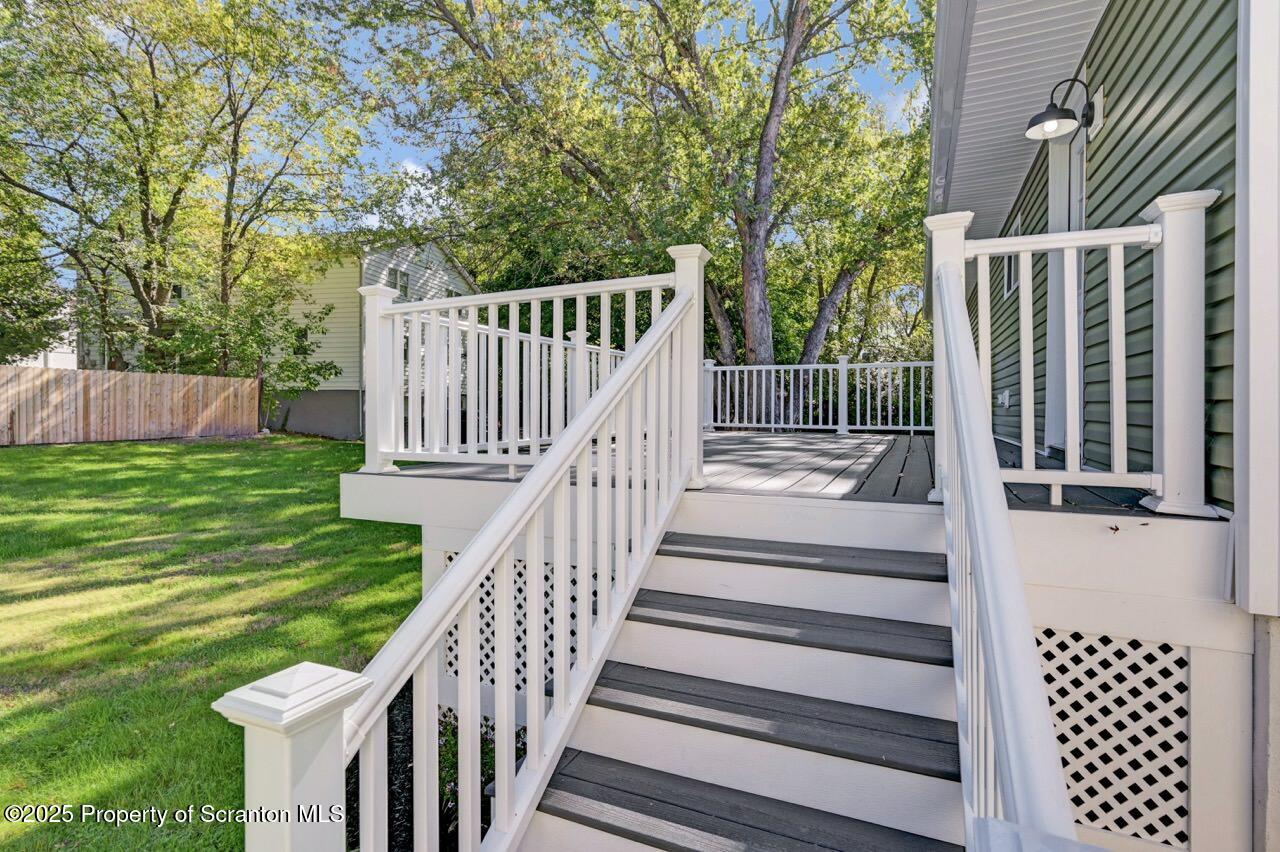 110 Morgan Street Jessup, PA 18434 - Photo 42 of 45 a view of deck with backyard and white fence