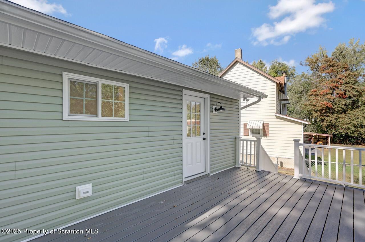 110 Morgan Street Jessup, PA 18434 - Photo 44 of 45 a view of a house with a deck