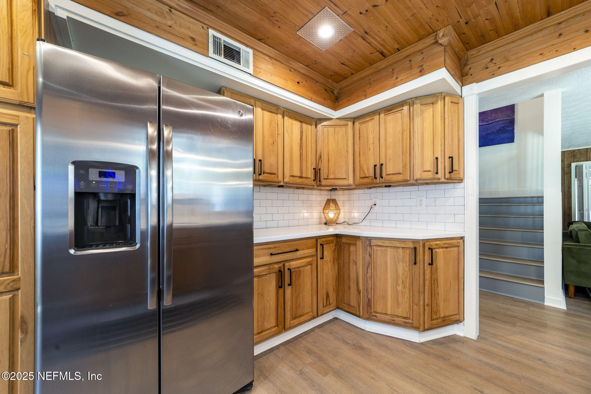 6183 George Hodges Road Macclenny, FL 32063 - Photo 17 of 97 a kitchen with stainless steel appliances granite countertop a refrigerator and a sink