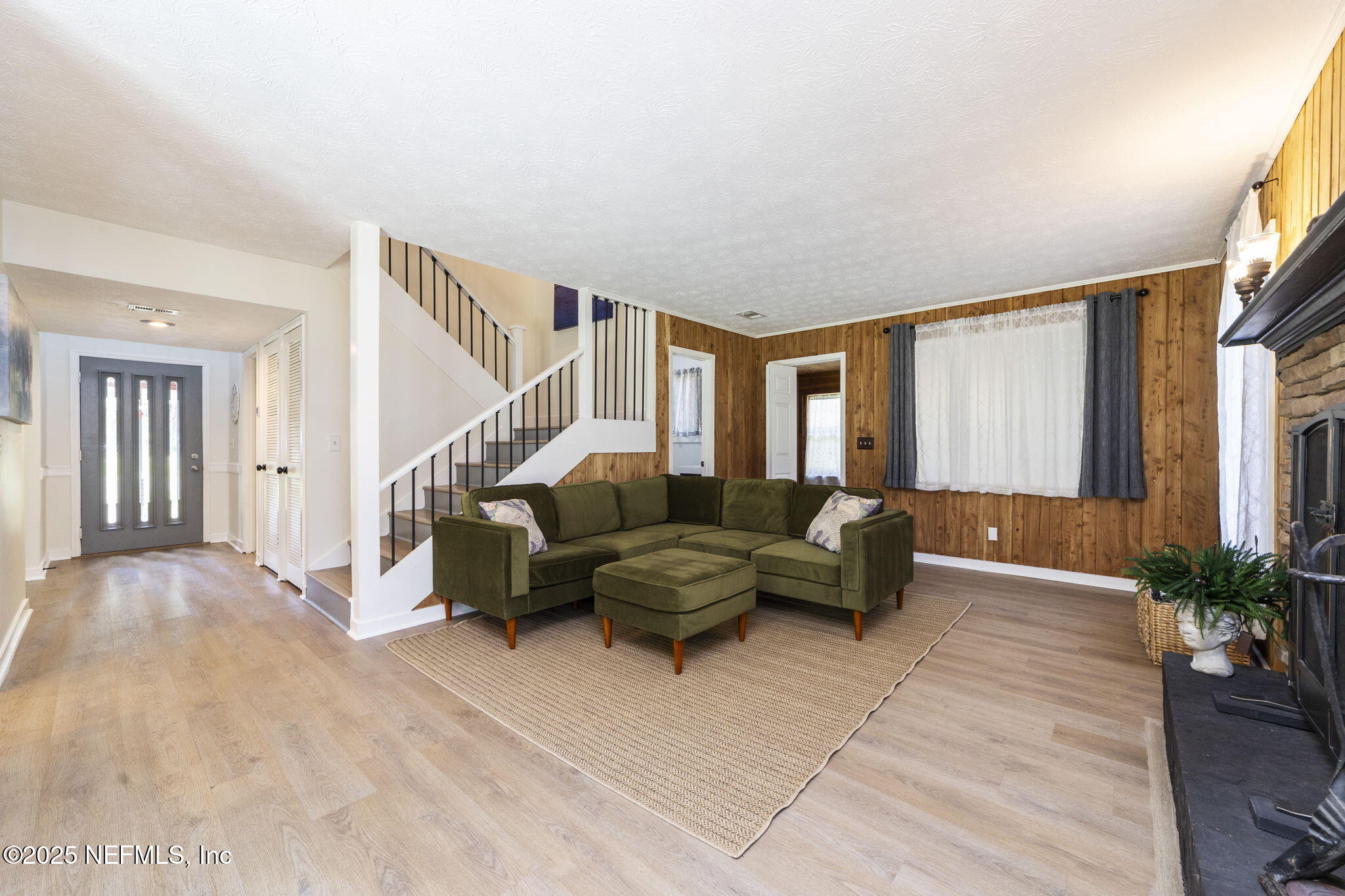 6183 George Hodges Road Macclenny, FL 32063 - Photo 20 of 97 a living room with furniture and a potted plant
