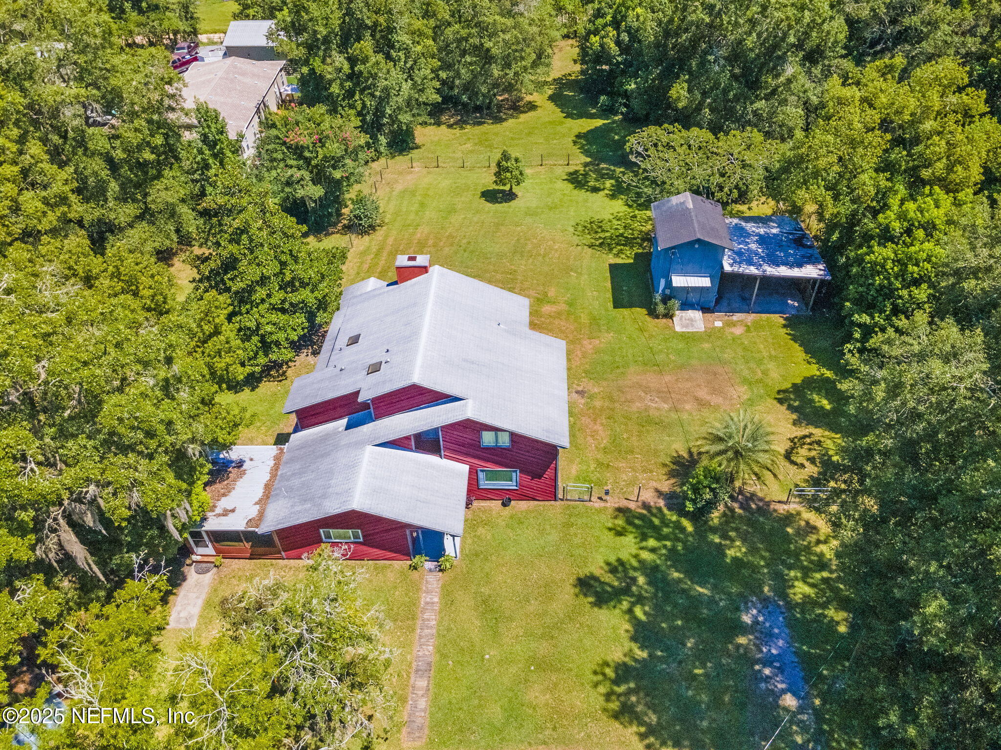 6183 George Hodges Road Macclenny, FL 32063 - Photo 2 of 97 an aerial view of residential houses with yard