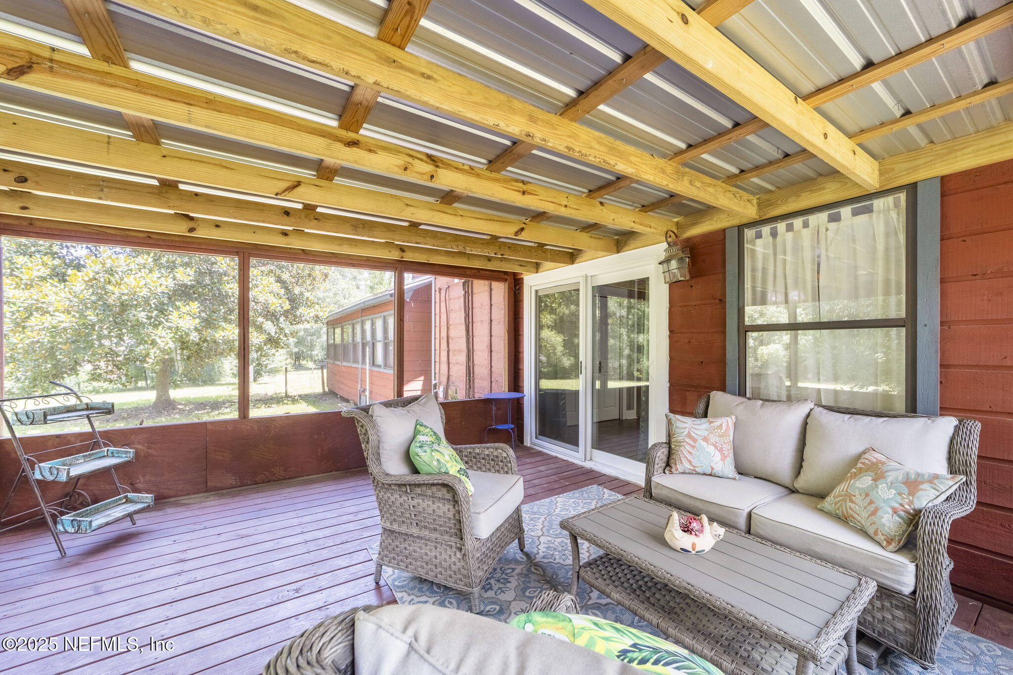 6183 George Hodges Road Macclenny, FL 32063 - Photo 44 of 97 a living room with furniture and a large window
