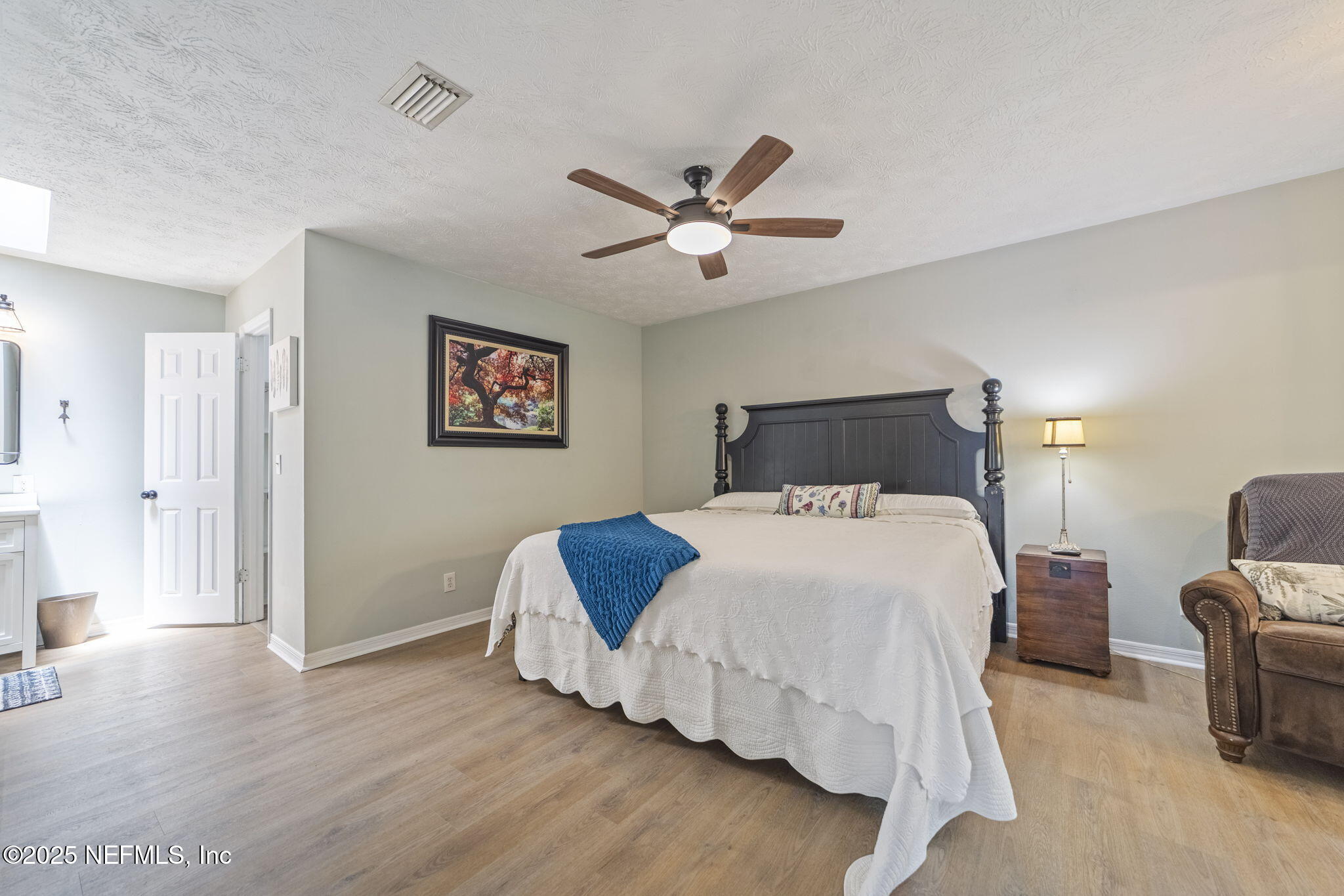 6183 George Hodges Road Macclenny, FL 32063 - Photo 47 of 97 a bedroom with a bed and a ceiling fan