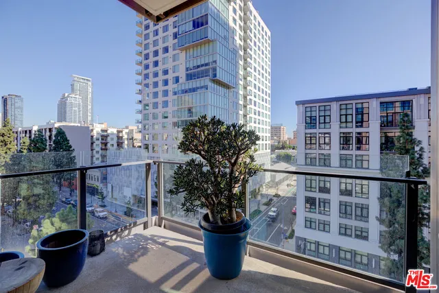 a view of a balcony with chairs