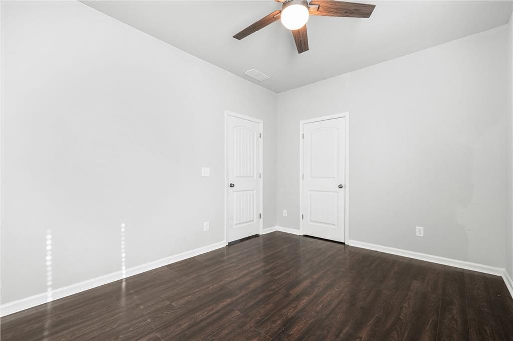 200 Cherokee Reserve Circle Canton, GA 30115 - Photo 41 of 50 wooden floor in an empty room