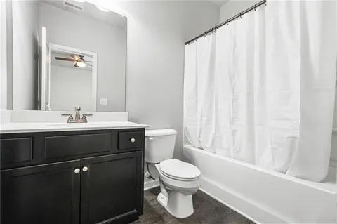 a picture of a wall with a white wall and a white refrigerator