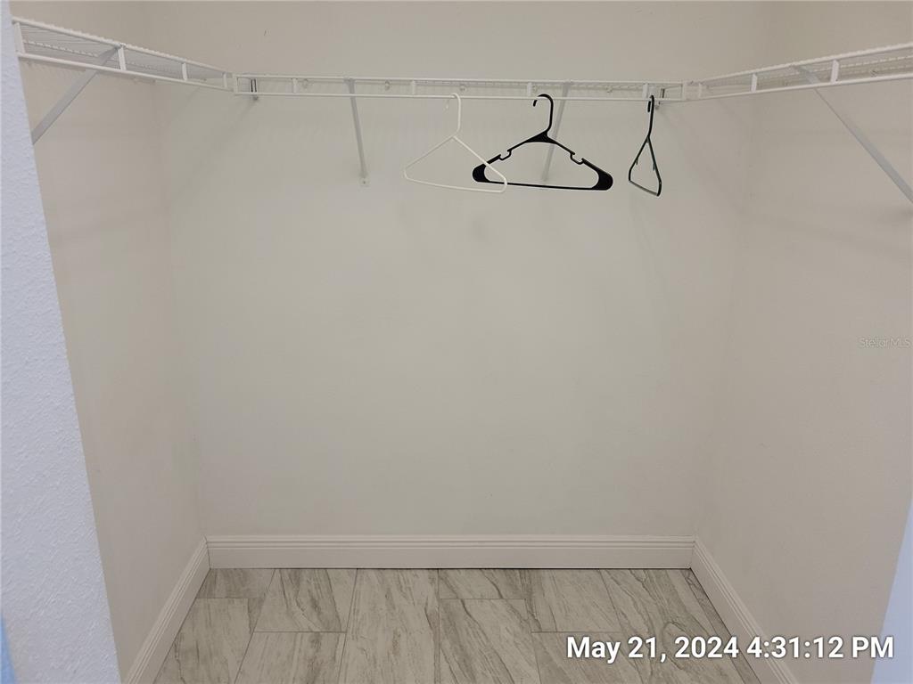 1013 Apollo Beach Boulevard, Unit 101 Apollo Beach, FL 33572 - Photo 11 of 19 a view of a rack on the wall