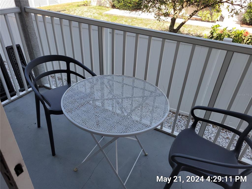 1013 Apollo Beach Boulevard, Unit 101 Apollo Beach, FL 33572 - Photo 15 of 19 a view of a furniture in a balcony