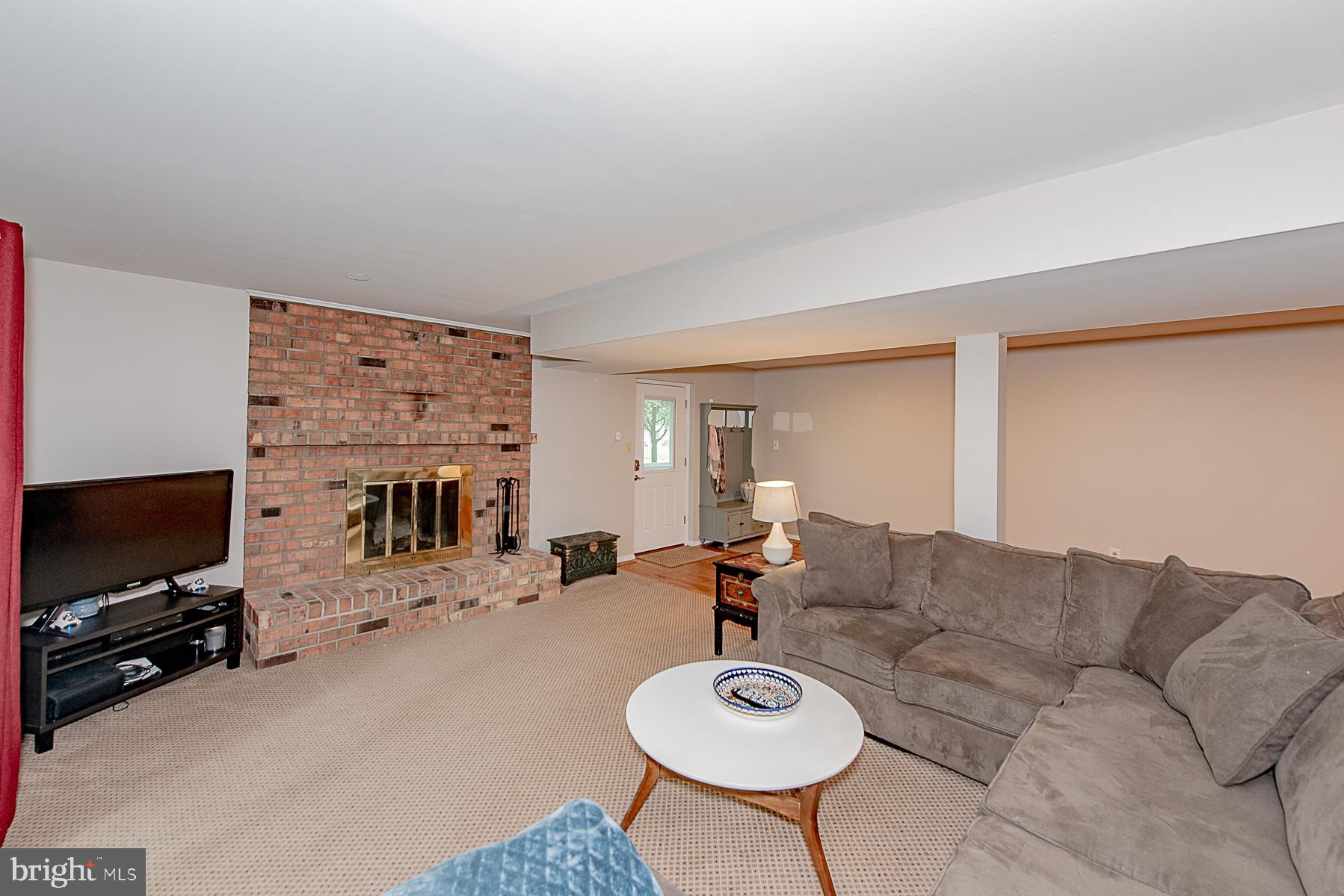 2617 Jonathan Road Ellicott City, MD 21042 - Photo 11 of 26 Family Room Brick-Surround, Wood-Burning Fireplace