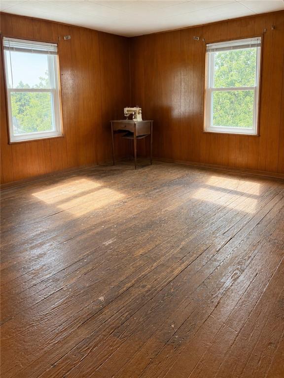 9155 Maple Street Pittsburgh, PA 15239 - Photo 14 of 16 an empty room with wooden floor and windows