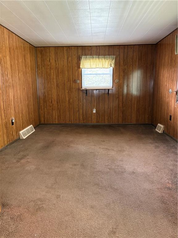 9155 Maple Street Pittsburgh, PA 15239 - Photo 9 of 16 an empty room with windows